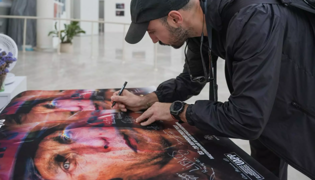 Photo exhibition dedicated to rescuers’ courage amid war opens in Kyiv